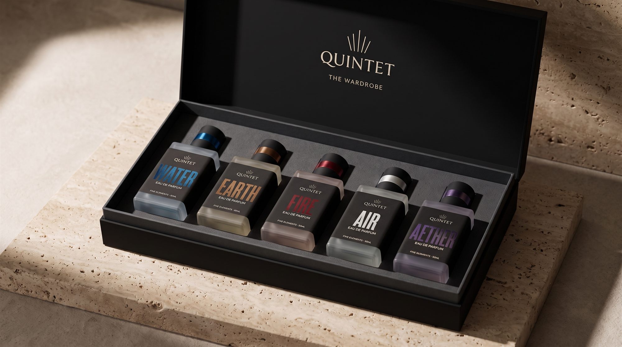 The Wardrobe — all five QUINTET bottles in a black sculptural coffret